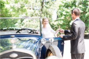 father of the bride and bride show up in antique car to the St. Vincent Martyr in morristown new jersey
