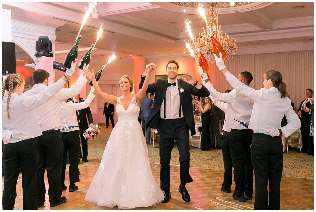 fun champagne sparkler entrance at bride and groom's 