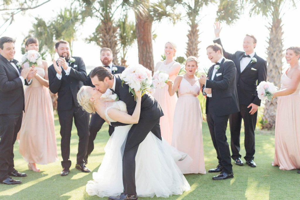 Wedding party cheers on the couple in Fripp Island
