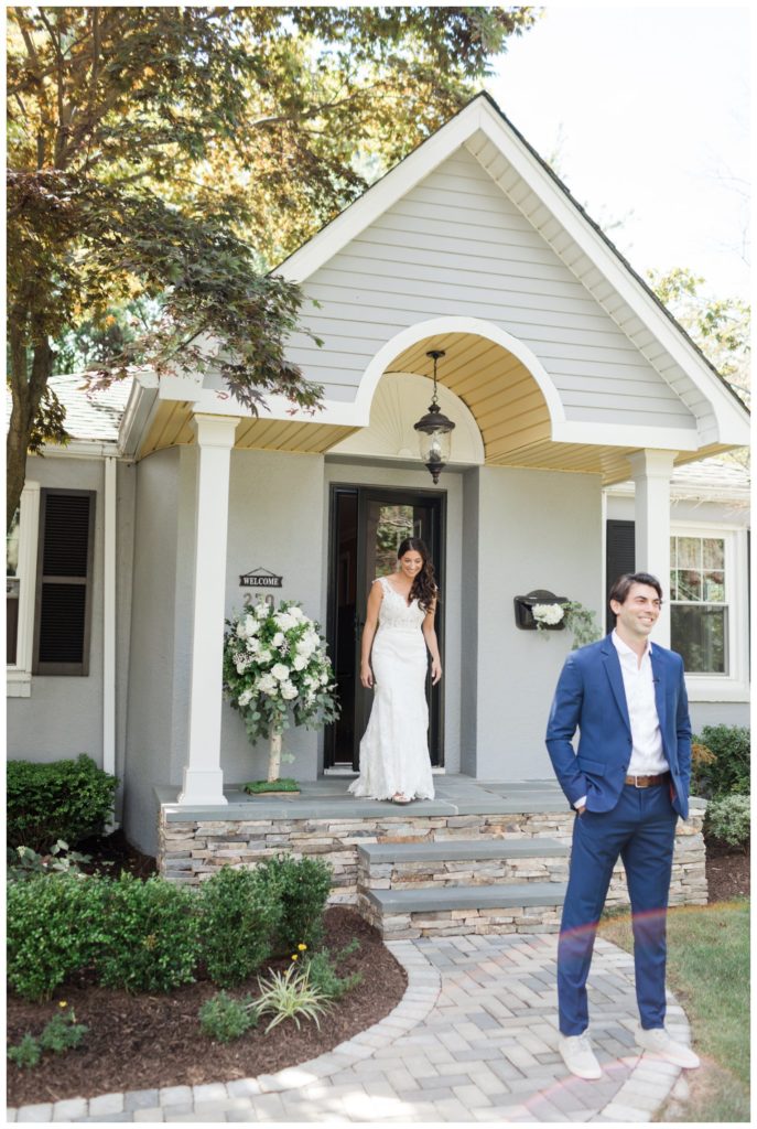 Front porch bride and groom first look